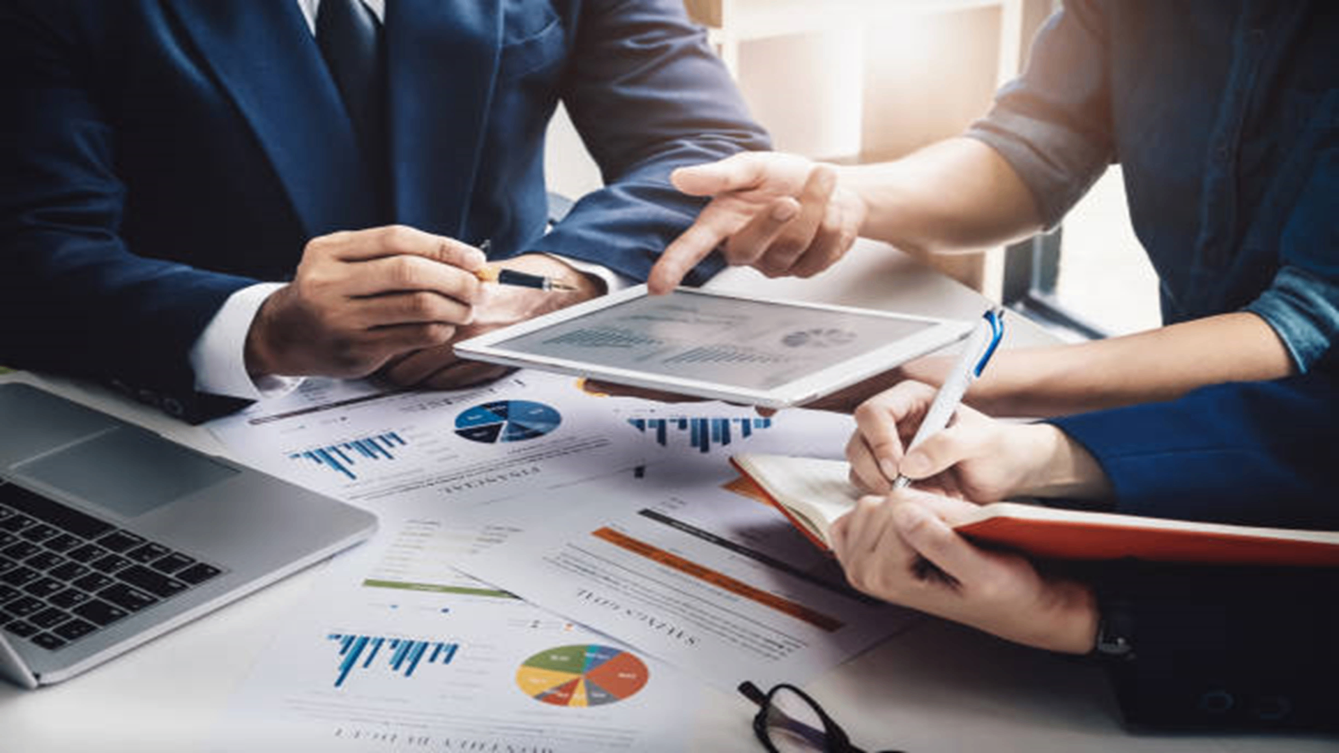 Parity Tax Consulting advisors reviewing financial reports